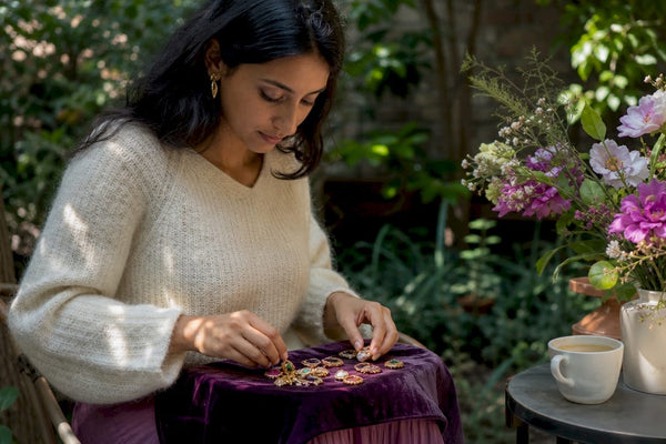 Woman exploring jewelry for self-expression