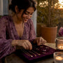 Woman arranging affordable luxury jewelry