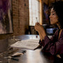 Jewelry designer examining ethical moissanite ring
