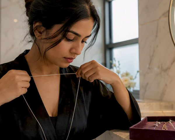 Woman measuring necklace length with string