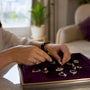 Woman's hands choosing moissanite rings close-up