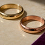 Cropped rose and yellow gold bands