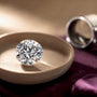 Near-colorless moissanite in an elegant jewelry dish