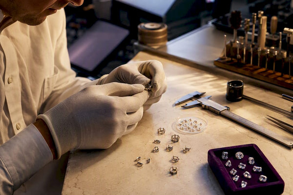 Swiss jewelry workshop inspecting materials