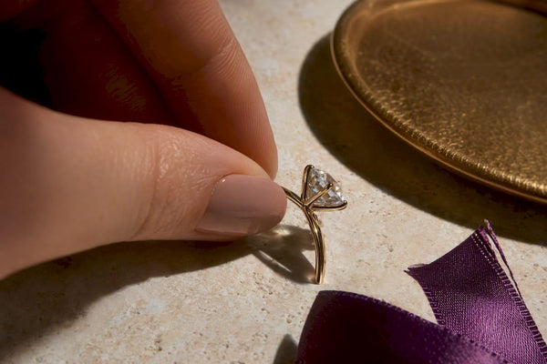 Cropped moissanite ring setting in dramatic light