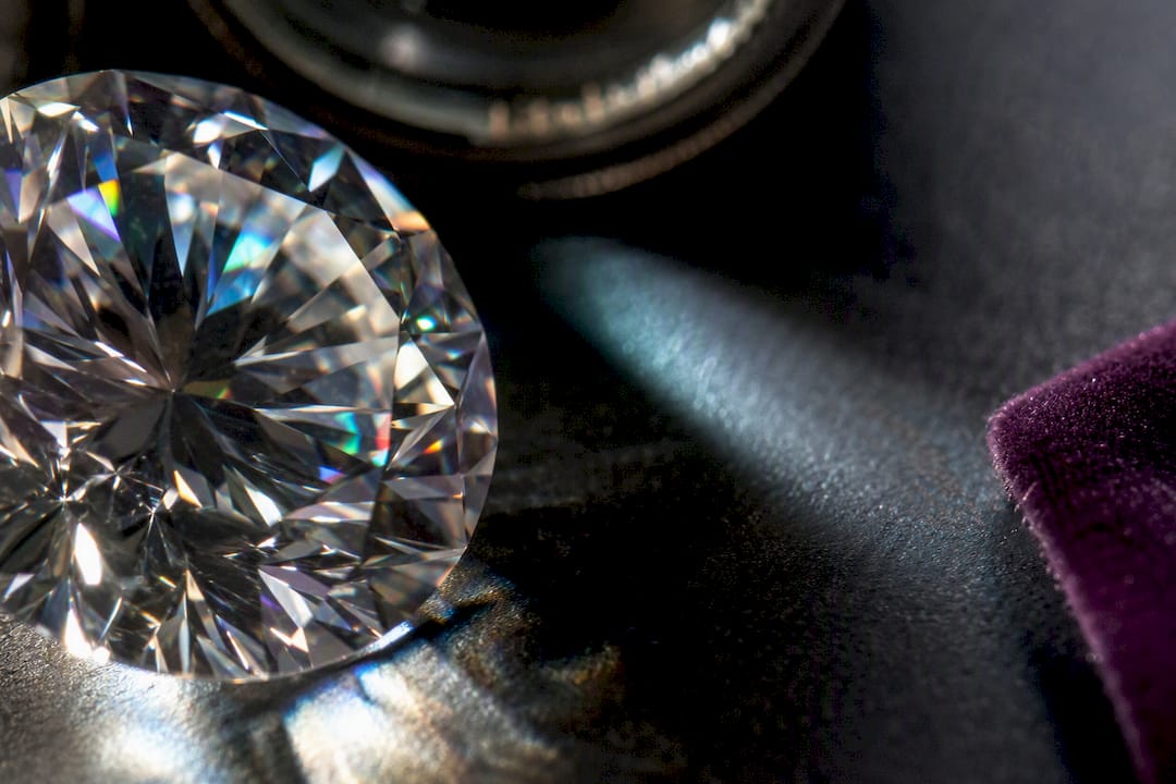 Faceted moissanite showing colorful light flashes