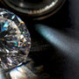 Faceted moissanite showing colorful light flashes