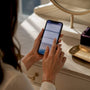 Hands sending a jewelry warranty email