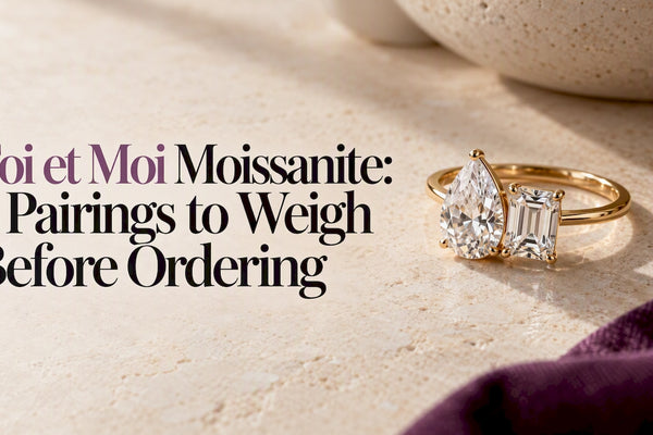 Two-stone moissanite ring on cream stone