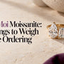 Two-stone moissanite ring on cream stone
