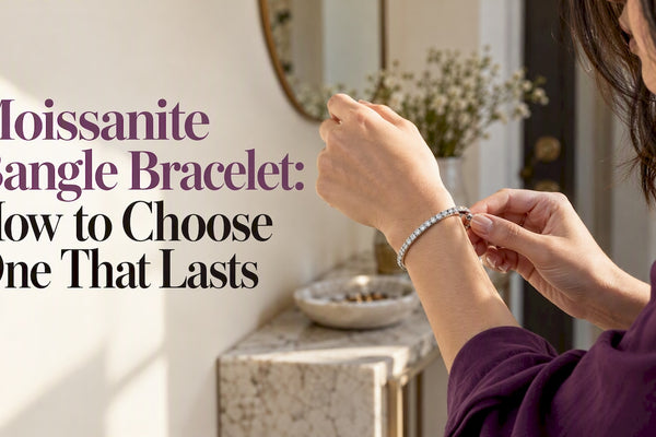 Woman fastening a moissanite bangle bracelet