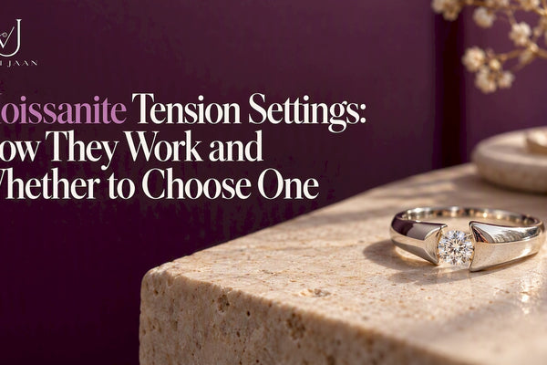 Moissanite held between open ring band ends