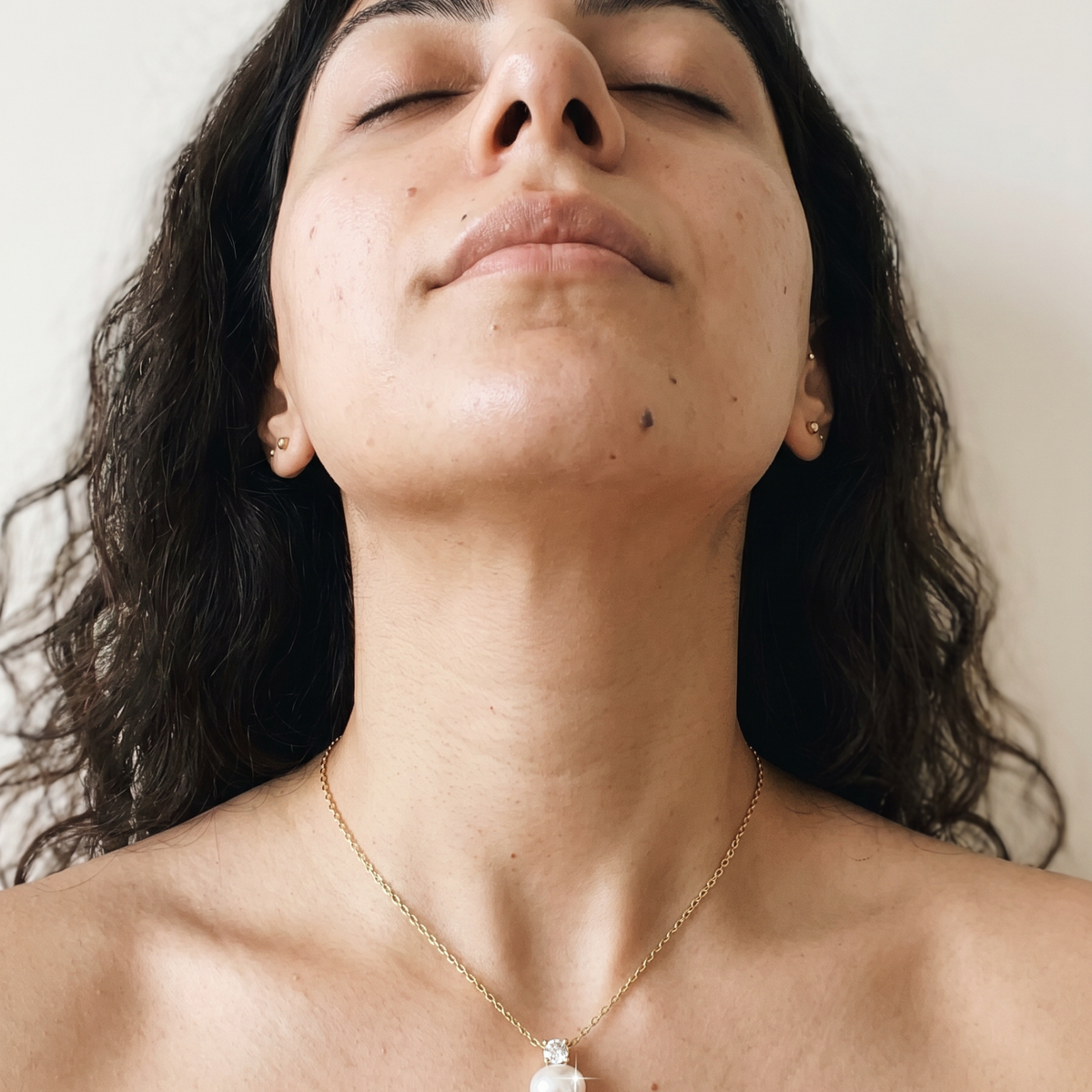 Baden Necklace by Meri Jaan — lab-grown moissanite necklace, worn by model