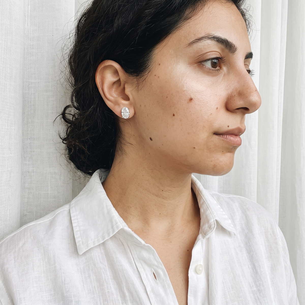 Bever Earrings worn by model