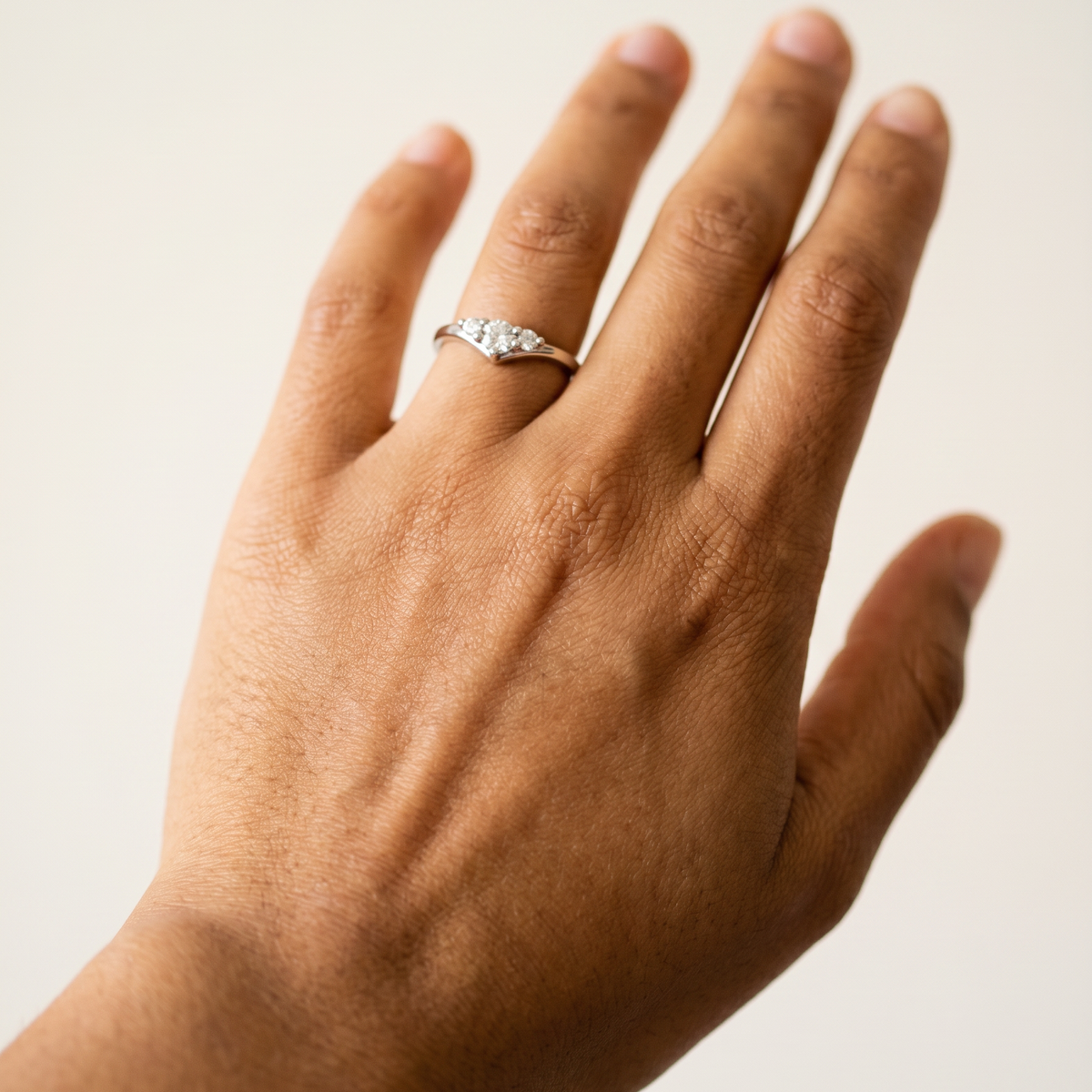 Emmetten Ring by Meri Jaan — lab-grown moissanite ring, worn by model