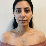 Jungfrau Necklace by Meri Jaan — lab-grown moissanite necklace, worn by model