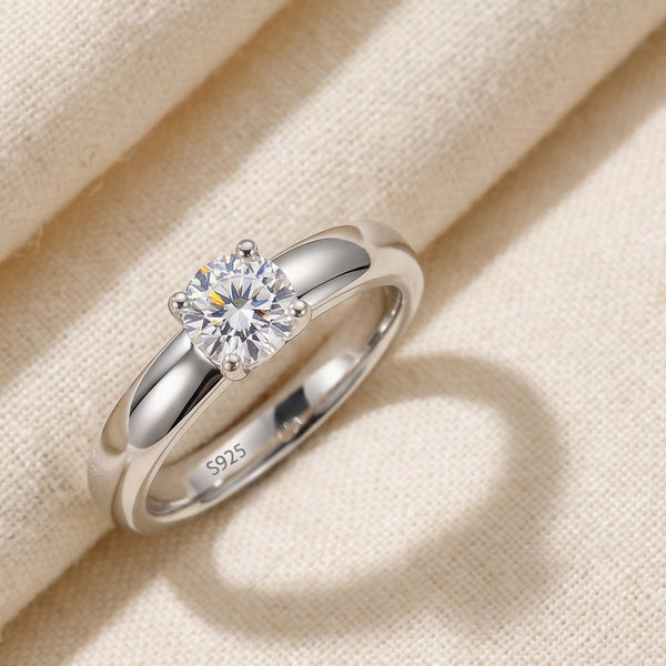 Jewelry $100 to $200 - Sils Maria sterling silver moissanite solitaire ring on cream linen