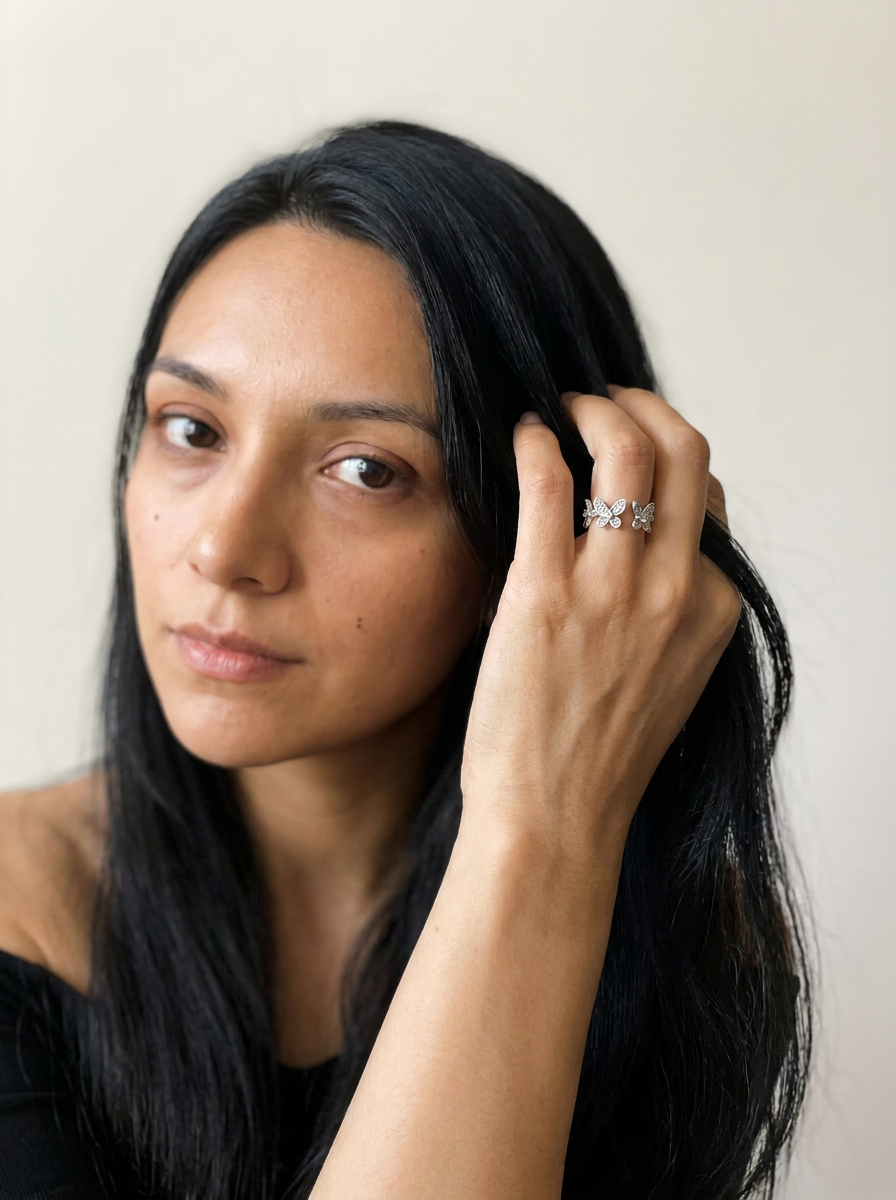 Open Butterfly Ring by Meri Jaan — lab-grown moissanite ring, worn by model