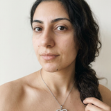 Schwyz Necklace by Meri Jaan — lab-grown moissanite necklace, worn by model