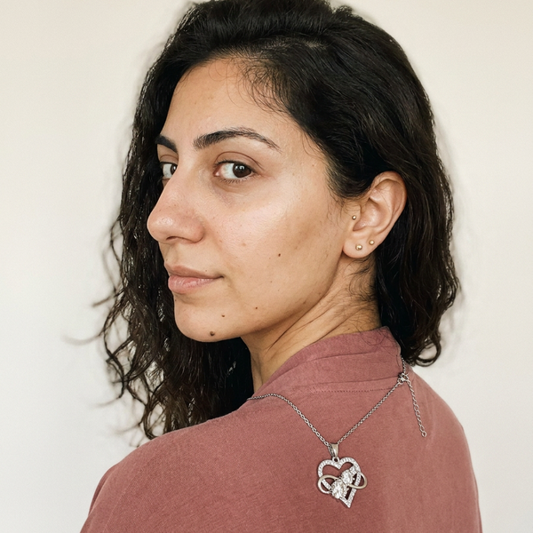 Schwyz Necklace by Meri Jaan — lab-grown moissanite necklace, worn by model