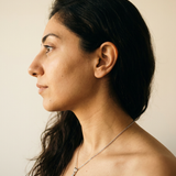 Vevey Necklace by Meri Jaan — lab-grown moissanite necklace, worn by model